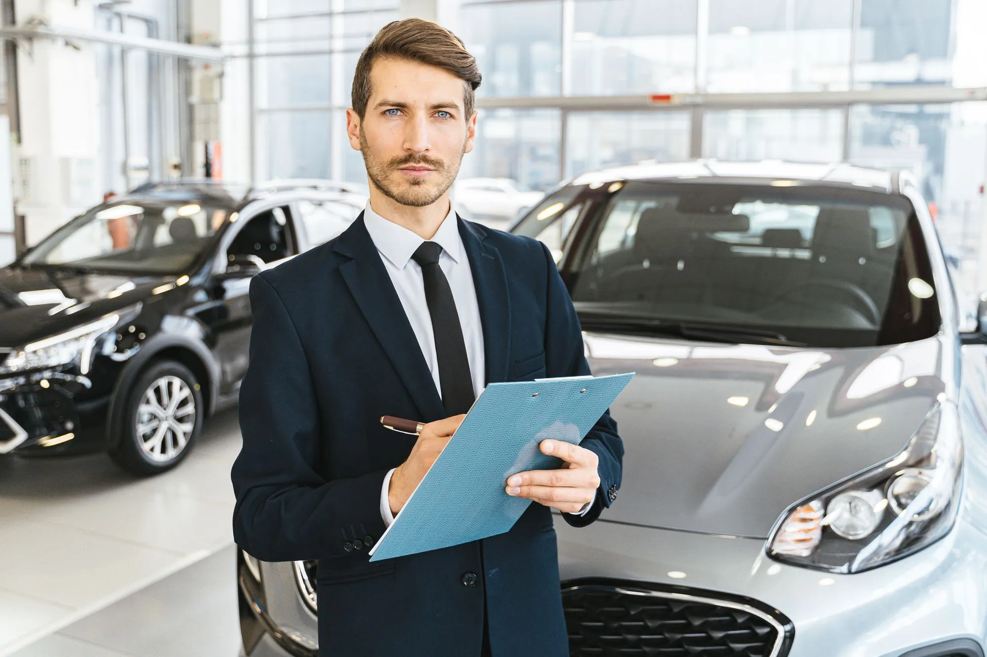 Reviewing a completed Auto Ally digital inspection report on a tablet
